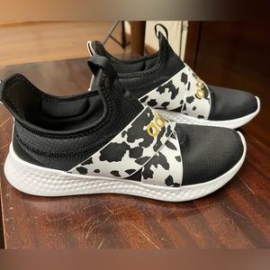 Women’s Adidas tennis shoes cow print